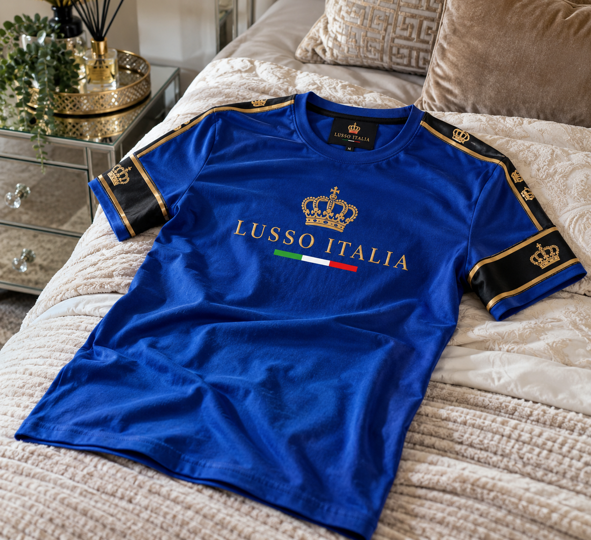 LUSSO ITALIA Blue Signature T-Shirt lifestyle photo styled on a bed
